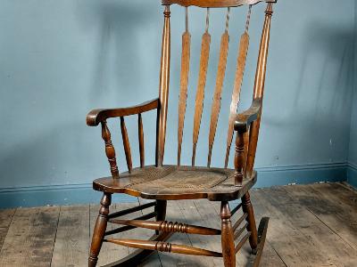 Antique rocking chair before restoration showing age and wear